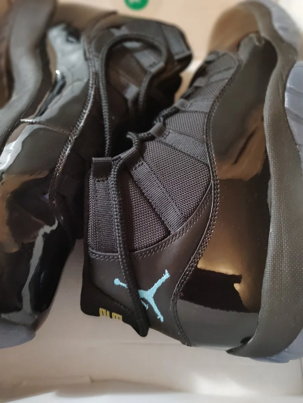 Jordan 11 Retro Gamma Blue/Black Patent Leather Sneakers with Light Blue Jumpman
